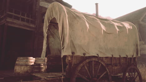 vintage covered wagon in a western town