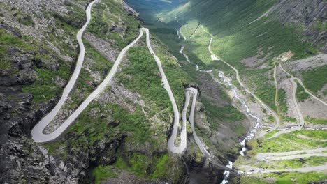 trollstigen mountain pass, norway - scenic route with hairpin turns in romsdalen valley - pan right