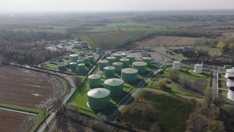 Aerial-view-of-steel-round-Oil-Storage-Tanks,-storage-and-handling-services-for-petroleum-products