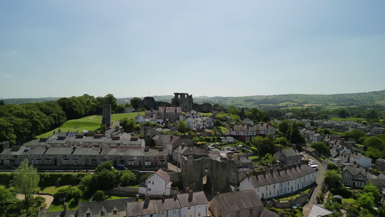 Denbigh Castle and Town Walls, Denbighshire, Wales - Aerial drone rise up and move in - June 23