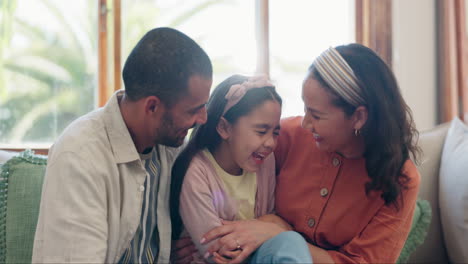 family, love and parents tickling their daughter