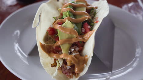 fresh fish seafood taco served with avocado and salsa in mazatlán sinaloa, mexico