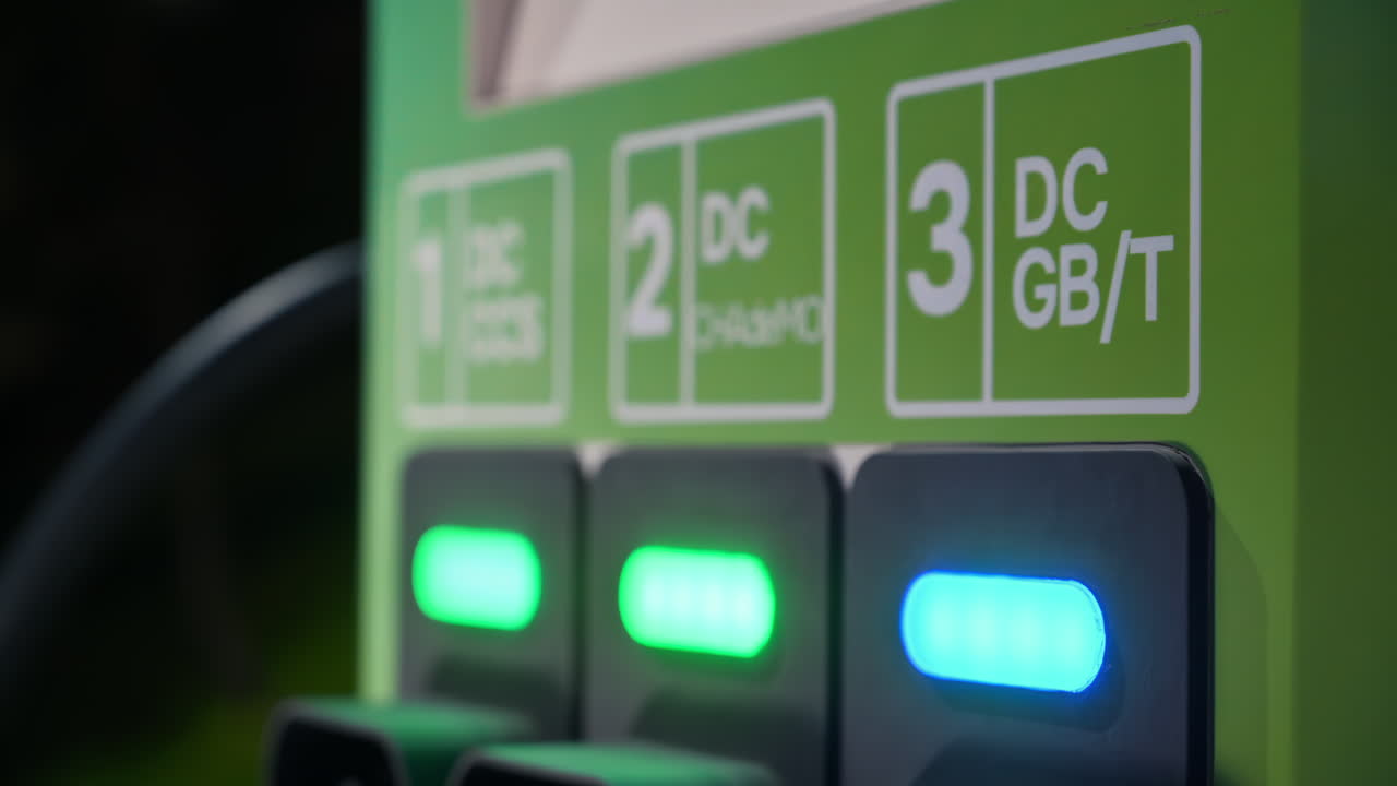 Chisinau, Moldova - April 18, 2024: Close-up of a green, BYD electric car charging station