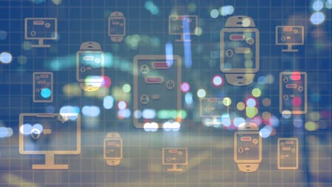 animation of icons of communication devices over city at night