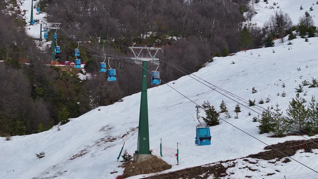 Ski Lift on a Snowy Mountain Slope