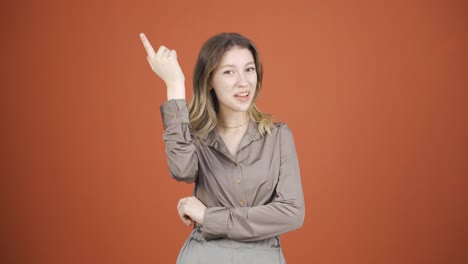 young woman showing mind to camera.