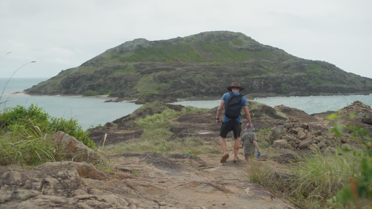 The landscape at the northernmost point of Australia, known as Pajinka, or The Tip, in Cape York. A man and his son are exploring. Clip 1
