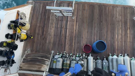 Diving-equipment-neatly-arranged-on-boat-deck-in-Egypt,-ready-for-underwater-adventure