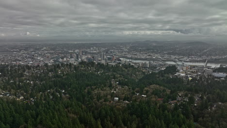 portland oregon aerial v122 panoramic view flyover southwest hills wooded neighborhood capturing full downtown cityscape with stormy clouds covering the sky - shot with mavic 3 cine - august 2022