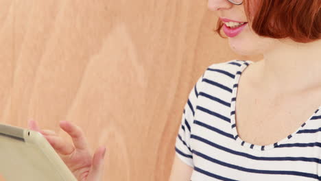 smiling hipster woman using tablet