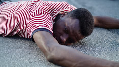 man lying on the ground