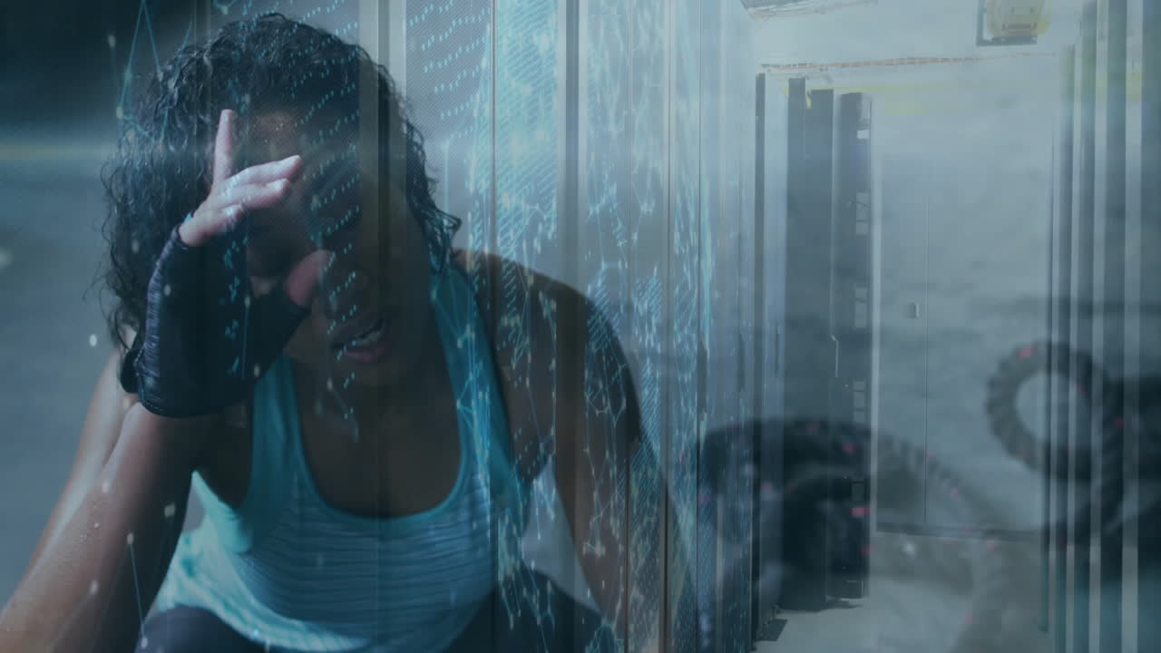 Resting in workout gear, woman with animation of digital data overlay