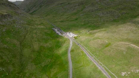 kirkstone pass inn on the edge of sunlight at the a592 pass summit. summer. , lake district, cumbria, uk