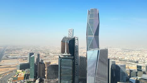 Drone-shot-beautiful-tall-glass-skyscrapers-in-city-in-Middle-East