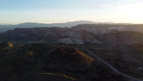 sunset drone view of dormant volcano in utah