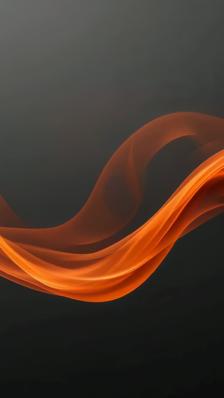 Vertical video: Forming right edge glowing orange ribbon wave gliding left across gray backdrop