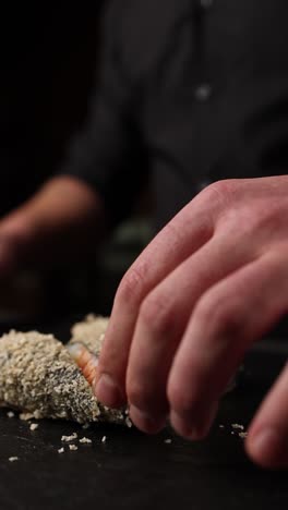 chef preparing sushi rolls