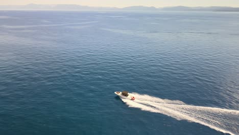 boat racing across lake tahoe