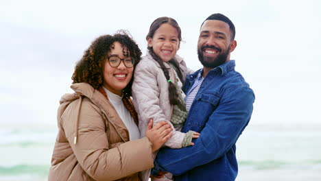 Happy-family-on-beach,-portrait-with-parents