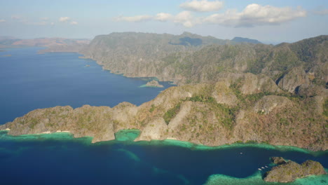 Banul-Beach-and-Sunset-Beach,-Rocks-in-the-coast-of-Coron-Island,-Palawan,-Philippines