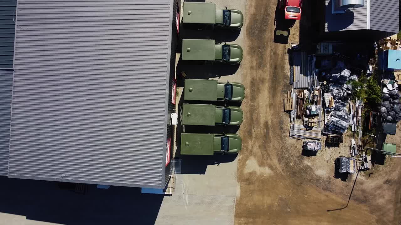 Drone Aerial descending shot of ambulances made for Ukraine