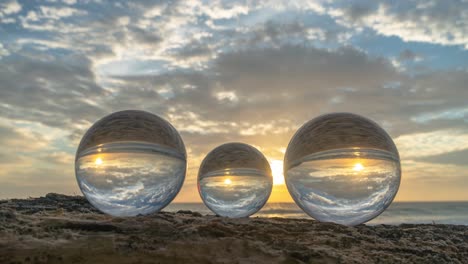 scenery sunset in crystal balls on the timber.