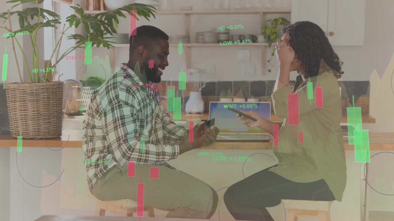 Woman showing phone, couple swapping phones in kitchen, viewing stock chart overlay checking trades
