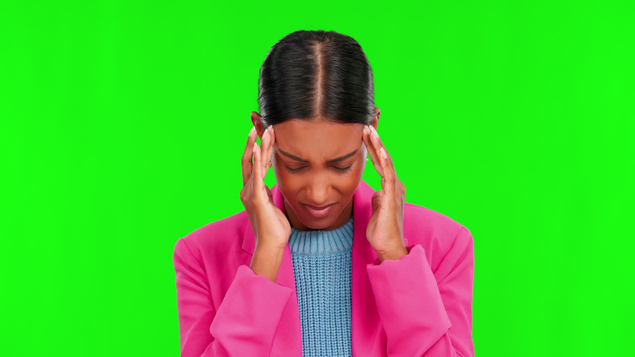 Headache, stress and pain with woman on green
