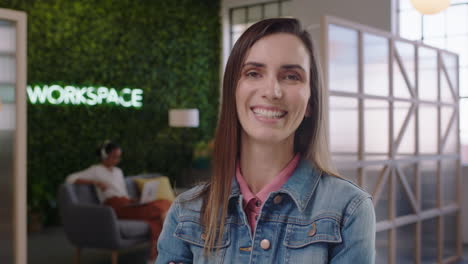 portrait-caucasian-business-woman-smiling-confident-happy-entrepreneur-enjoying-successful-startup-company-proud-female-manager-arms-crossed-in-trendy-office-workspace