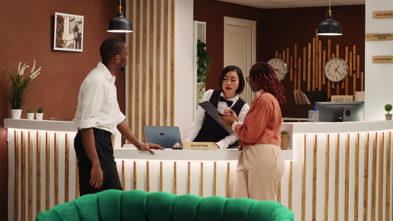 Receptionist upselling room amenities