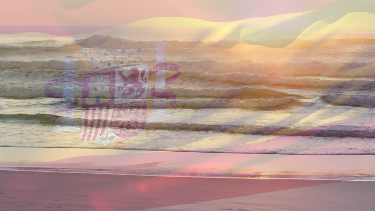 해변과 바다 파도의 시야를 배경으로 스페인 국기를 흔드는 디지털 구성