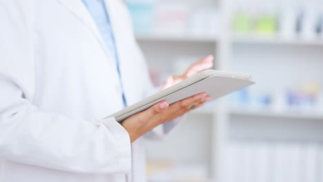 doctor using tablet in pharmacy