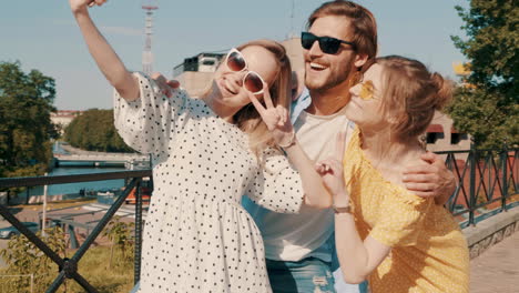 friends taking a selfie outdoors