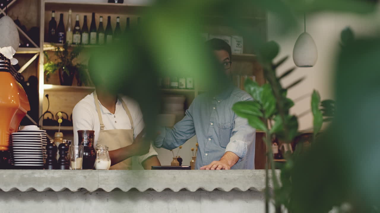 Manager training new staff small business wine bar cafe