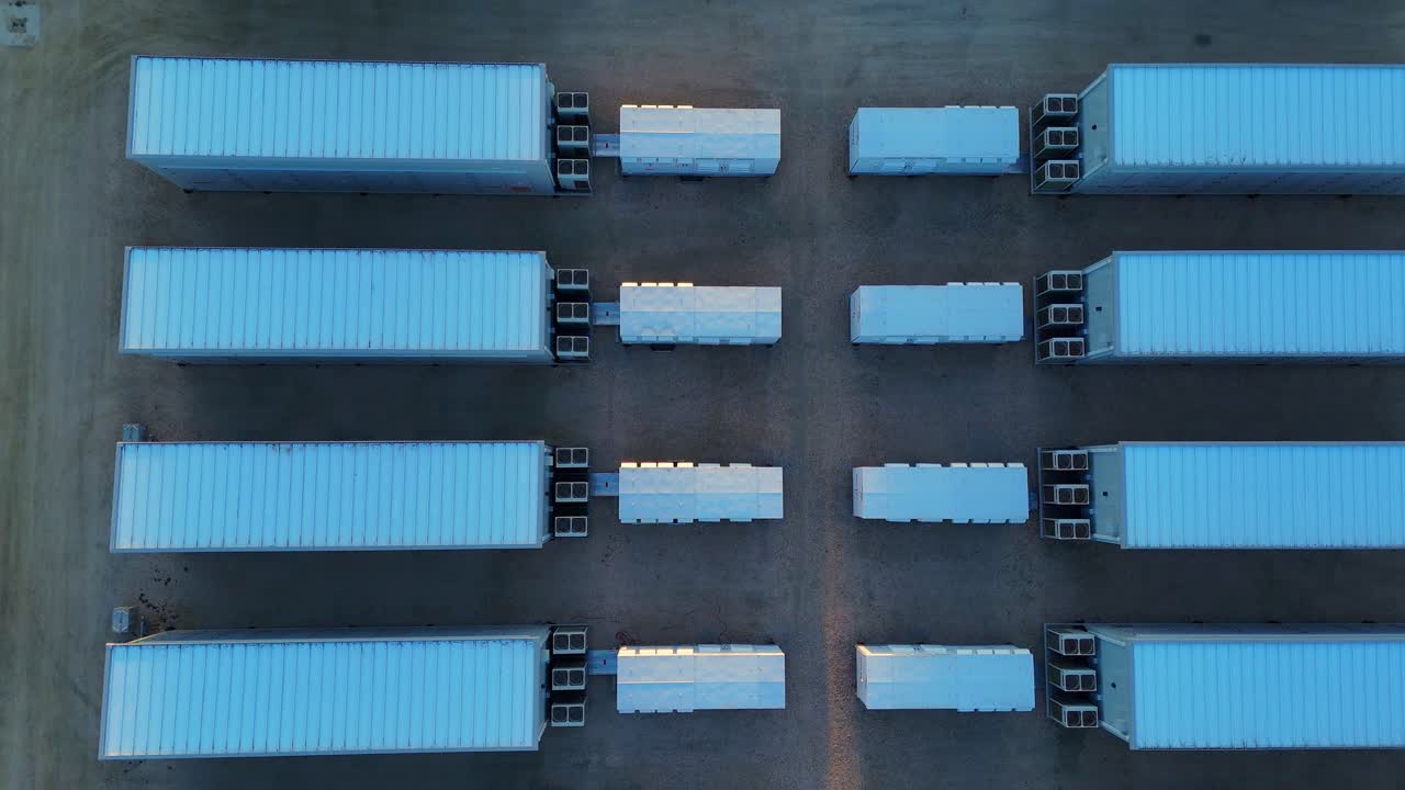 Symmetrical top-down view of battery units in energy storage facility, Moss Landing, 2,500 MWh, California, USA