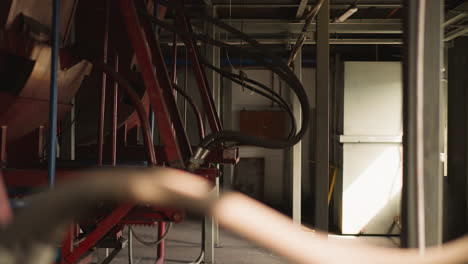 Pipe-connected-to-huge-boiler-on-support-in-mechanical-room