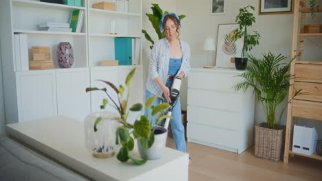 Joyful-Woman-Dancing-While-Vacuuming