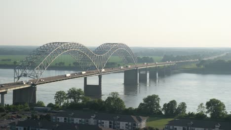 telephoto panning shot of interstate 40 mississippi river arkansas in the background