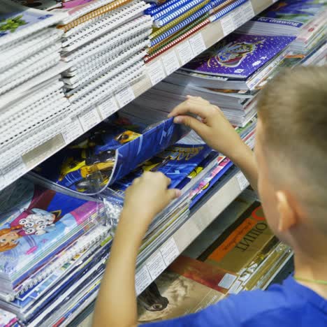 vinnitsa, ukraine - august, 2018: purchase of school stationery in the store.