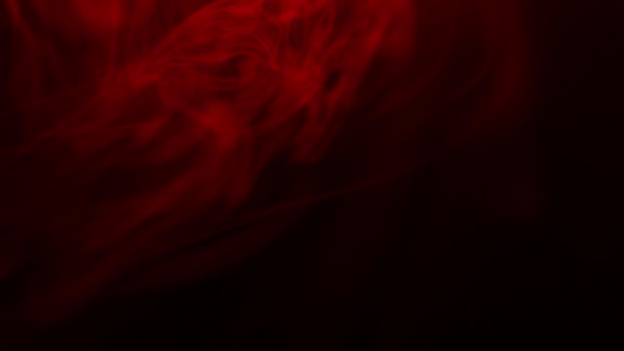Vero fumo rosso su sfondo nero
