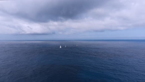 drone video from malta, mellieha, armier, about a group of sailing boat in a stormy weather