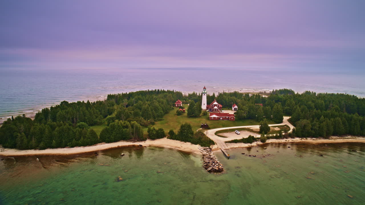 Aerial View of a Lighthouse on a Secluded Island