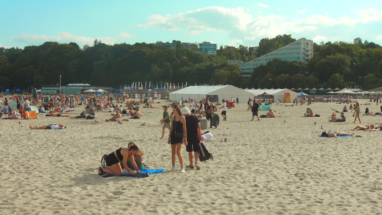 Tourists visiting the seaside in Gdynia, Poland.