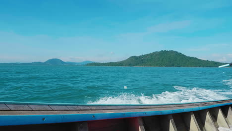 view from a longtail boat on the ocean