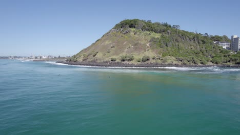 burleigh heads beach during summer in queensland, gold coast, australia - aerial shot