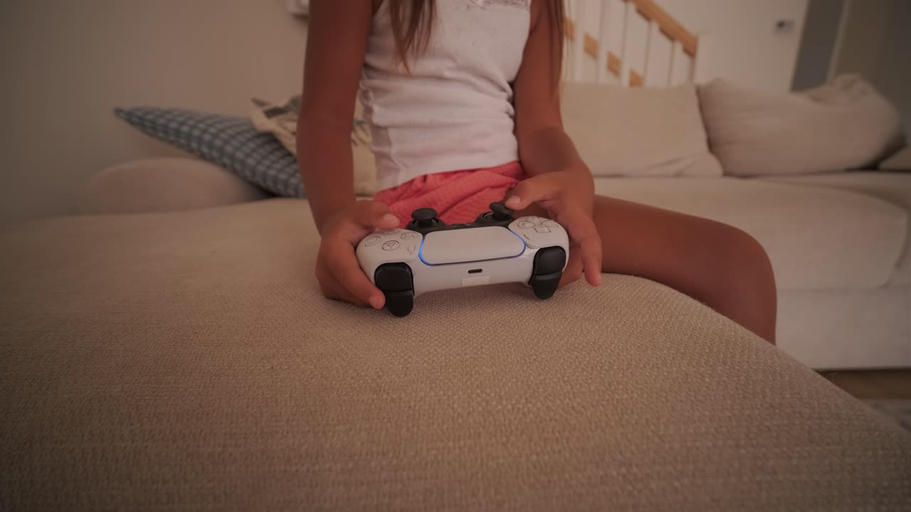 Child Playing Video Games on PlayStation 5