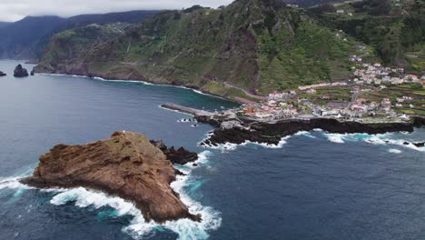 Small-town-near-coast-in-Madeira-drone-aerial,-Portugal