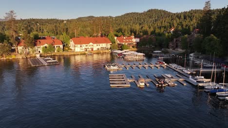 lake arrowhead village fly over boats and boat docks aerial dolly raise up