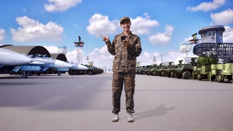 military personnel using smartphone at airbase