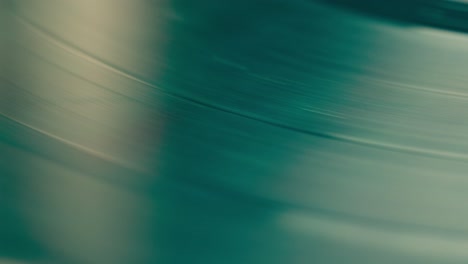 record spinning, vinyl player record spinning, spinning vinyl turntable close up, macro needle playing music, analog audio track. 4k resolution.